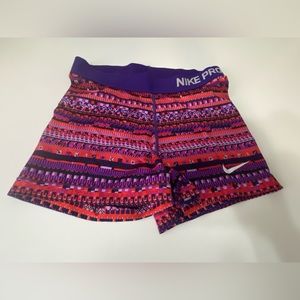 Nike Pro red and purple printed shorts